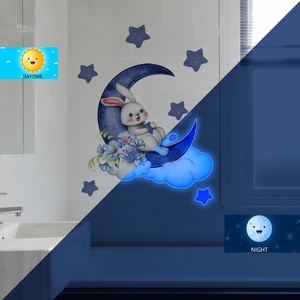 Luminous wall stickers featuring moon, star, and bunny with day and night glowing effect