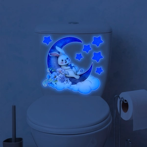Luminous wall sticker showing a cartoon rabbit on a blue moon with glowing stars and clouds