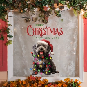 Close-up of Christmas black dog window sticker with festive lights on frosted glass panel