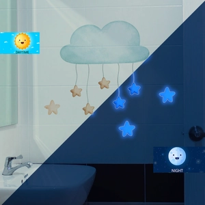 Luminous cloud and hanging stars wall decal showing daytime and blue night glow effect