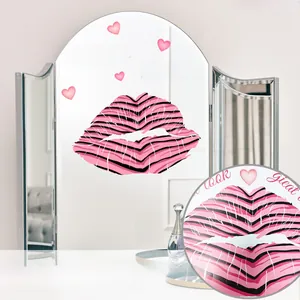 Detail of pink lip mirror wall sticker with hearts and You look great today text