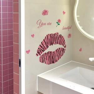 Pink lips and rose wall decals with You are beautiful text applied to bathroom wall