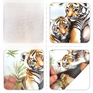 Detail of waterproof cartoon tiger wall stickers showing front and reverse sides of decals