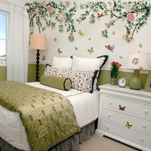 Nature wall sticker featuring green branches, pink flowers, birds and colorful butterflies