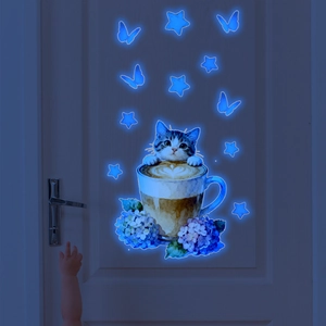 Glow-in-the-dark wall stickers featuring a cat in a coffee cup with blue butterflies