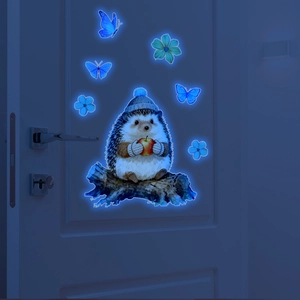 Glow in the dark wall sticker showing a cute hedgehog with an apple and blue night light