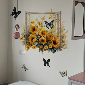 Detail of 3D sunflower window wall sticker with colorful butterflies on white wall