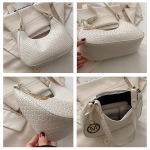 Detailed views of beige woven texture half-moon bag with gold M-logo and interior capacity