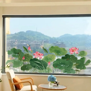 Detail of static window cling featuring watercolor lotus, dragonfly and water drops