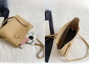 Vue détaillée de l'intérieur d'un grand sac cabas beige montrant son compartiment spacieux
