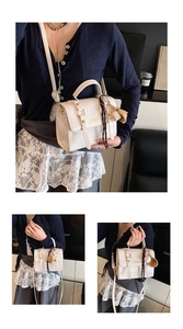 Detail of cream white leather crossbody bag with fashion print and silk scarf accessory
