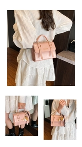 Detailed close-up of pink PU leather square bag with gold buckle and silk scarf