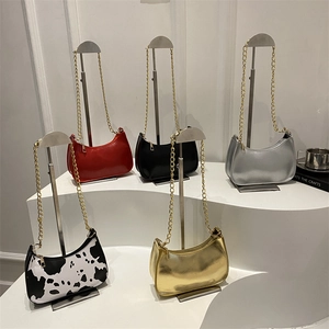Chic crescent moon shoulder bags with gold chain straps in five vibrant fashion colors