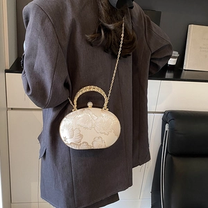 Elegant beige floral embroidery evening bag with pearl clasp and gold chain strap