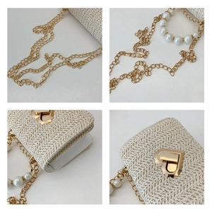 Detailed macro view of woven straw texture with golden heart lock and pearl handle