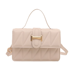 Chic beige quilted crossbody bag with golden rectangular clasp and adjustable strap