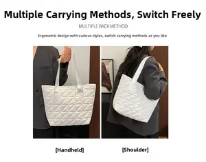Quilted white tote bag showing dual-use versatility for shoulder and hand-carry