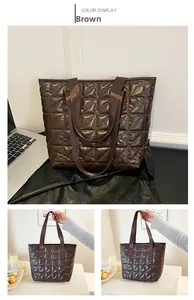 Detailed view of brown quilted tote bag with diamond stitching and glossy PU leather texture