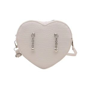White heart-shaped crossbody bag with crocodile texture and silver chain charms