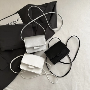 Chic mini crossbody bags in silver, black and white leather with slim shoulder straps