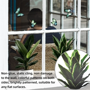 Detail of static green leaf and butterfly window stickers showing double-sided design