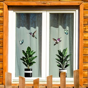 Static cling window decals with creative hand-painted plants, birds, and colorful butterflies