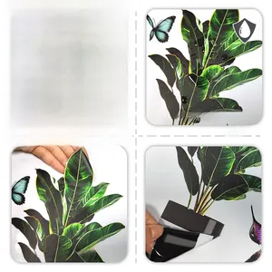 Waterproof static window sticker detail showing green plants and bird with black backing
