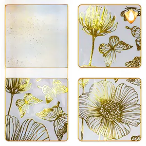 Detail of waterproof gold foil wall stickers featuring floral and butterfly motifs