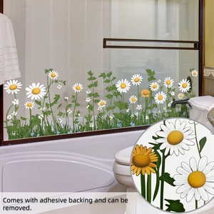 Detail von selbstklebendem Gänseblümchen-Wandsticker auf einer Glastür-Oberfläche