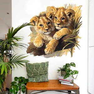 Creative hand-painted wall sticker featuring two cute lion cubs resting on a tree trunk