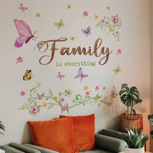Colorful floral vine wall stickers with butterflies and Family is everything text