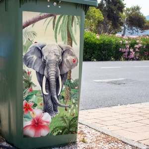 Creative elephant and tropical leaf waterproof wall sticker on a large outdoor green bin