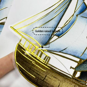 Detail of golden raised texture on sailing boat wall sticker with metallic finish