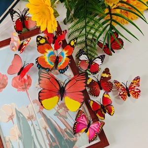 Close-up of 3D decorative butterflies with gold stamping on wooden frame and sunflower