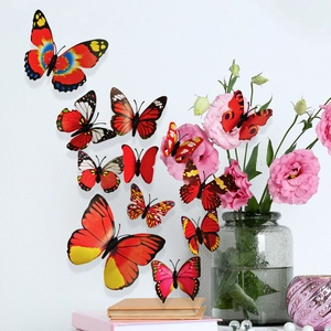 Detail showing 3D butterfly wall stickers with gold stamping on white textured wall