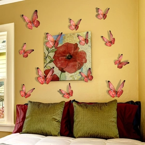 Detailed 3D gradient pink skull butterfly wall stickers with golden finish in a bedroom