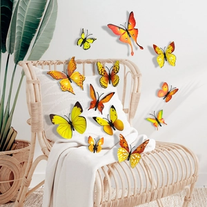 Detailed 3D butterfly wall stickers with colorful patterns on a white cushion