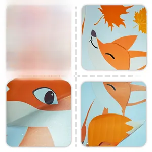 Detail of fox and maple leaf window clings showing matte texture and static side