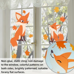 Static cling window stickers featuring cartoon foxes and autumn maple leaves on glass