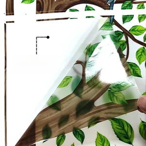 Detail of self-adhesive backing on bird and tree wall sticker for easy removal