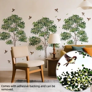 Detail of tree and bird wall stickers showing adhesive backing and removable feature