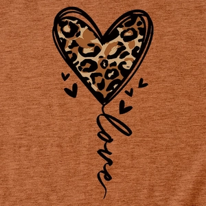 Detail of caramel knit T-shirt featuring leopard print heart and love script design