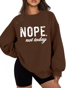 Front view of a brown oversized sweatshirt with NOPE. not today text on white background