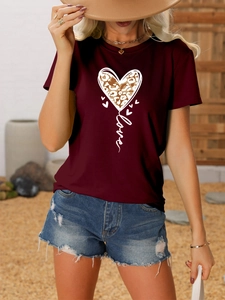 Detail of burgundy T-shirt featuring leopard print heart and Love text graphic