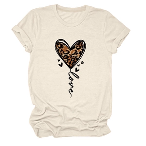 Detailed view of the leopard print heart and script love lettering on the cream cotton t-shirt