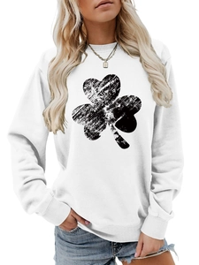 Detail of white crewneck sweatshirt featuring a black distressed clover print on cotton fabric