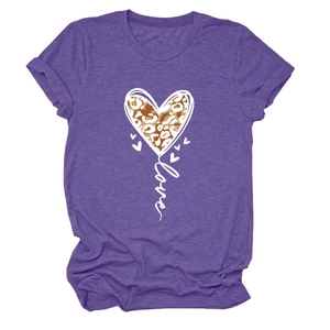 Close-up of heart leopard print and white love script on dark purple t-shirt fabric