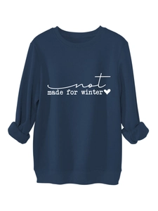 Detail of navy blue fleece sweatshirt featuring white not made for winter typography