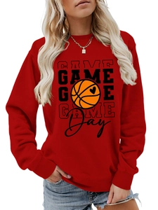 Close-up of red Game Day sweatshirt featuring basketball heart print and raglan sleeves