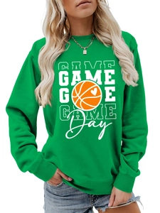 Detail of green Game Day sweatshirt featuring basketball heart print and cotton fabric texture